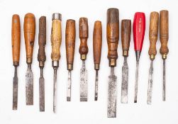 A group of twelve various chisels: various sizes and makers including Marples & Son,
