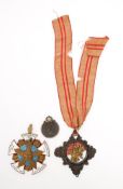 A WWII German Eastern Medal: together with two German enamel lodge or regimental jewels (3)