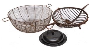 A Continental circular iron twin-handled basket spit: with suspension chains, 41cm diameter,