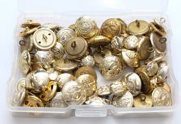 A collection of various regimental buttons and cap badges: including RAF,