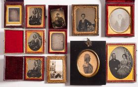 A group of nine various 19th century daguerreotype and ambrotype portraits: including three of the
