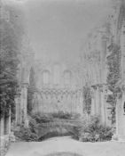 A collection of early 20th century quarter plate negatives,: GB topographical and portrait images,