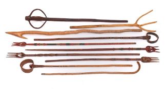 A Pyrenean hay stick: with hooked end, a three pronged fork, a whisk,