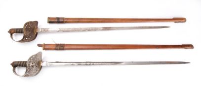 Two George V Officers' Dress swords:, both with acid etched crown and 'GRV' cipher,