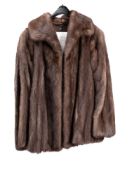 A vintage natural 'Lutetia' gunmetal mink jacket with silk lining, together with original receipt.