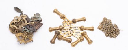 A collection of various Victorian and later brass escutcheon and keyhole covers:
