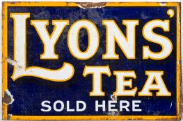 An early 20th century enamel double sided sign 'Lyons Tea Sold Here',