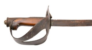 A 19th century cavalry sword, the pipe backed blade over half basket hilt with wooden grip.