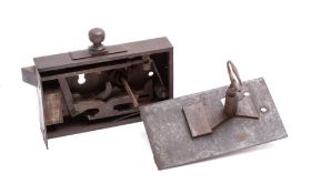 A 19th century steel rim lock: the external side with double throw mortice and single latch