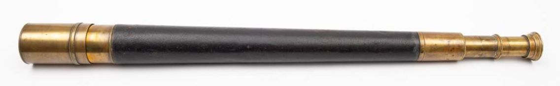A leather cased double draw telescope, unsigned.