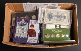 A small box of GB and world coinage: containing UK 1994/9596/97/98/99 2001 uncirculated sets with