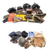 A collection of various militaria: including two German post war peaked caps, canvas webbing,