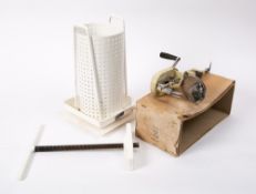 The 'Kwikpeel' Apple Peeler: in cream enamel with table clamp, also a Walker Desmond fruit press,