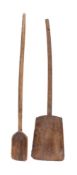 Two wooden grain milling scoops:, 116cm and 121cm long.