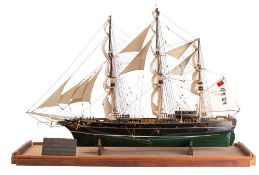 A scale model of the Cutty Sark: fully rigged over detailed deck with davits,