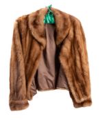 A fur coat by Harry Fish of Chesterfield.