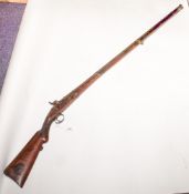 A 19th century Indian percussion cap rifle: the quadruple banded barrel with cannon barrel muzzle