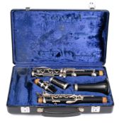 A Bosey & Hawkes clarinet: serial number '267317' in fitted hard shell case.
