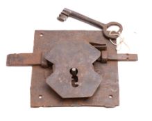 A French wrought iron lock and key,