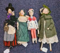 A late Victorian Welsh wooden peg doll with painted face and dressed in traditional costume,