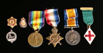 A WWI trio to '94977 Spr., A.M. Bruce R.E': together with four other badges.