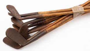 Eleven various golfing irons: all on hickory shafts, including D Adams Mashie, F R Frostick No.