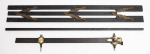 An early 19th century 32 1/4 inch ebony and brass parallel rule: unsigned,