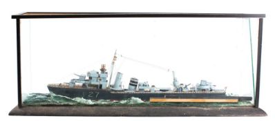 A scratch built waterline model of the Royal Navy frigate F127; with radio masts,