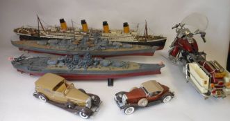 A collection of constructed plastic ship, motorcycle and car models: includes RMS Titanic, Bismark,