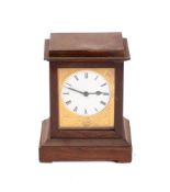 A late 19th century French rosewood mantel clock: the white enamel dial with Roman numerals, 16.