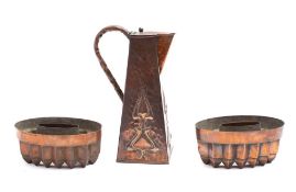 An Art Nouveau copper jug of square form with planished body: unsigned,