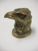A 19th century brass eagle head inkwell: unsigned,