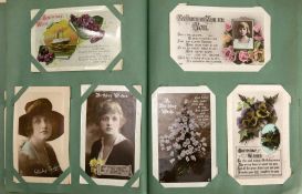 An extensive WWI period postcard collection in album: inscribed in pencil to end paper 'Given to me
