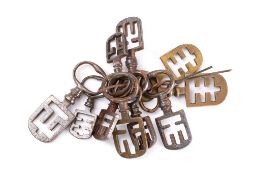 A collection of ten French night latch keys: comprising brass and steel examples.
