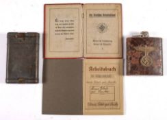 A WWII German K98 gun cleaning kit: dated '1939' ( incomplete) together with a leather covered hip