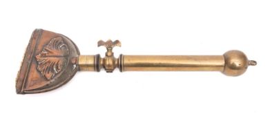 A Victorian brass and copper horsehair singer: with foliate decoration.