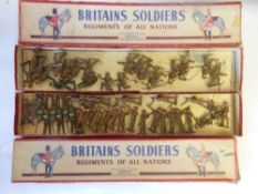 John Hill & Co and others, a collection of khaki figures: with steel or cloth hats, standing firing,