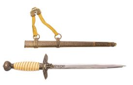 A reproduction German Luftwaffe dagger in scabbard.