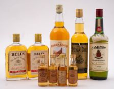 Three bottles of Whisky;- Jameson Irish Whiskey, Famous Grouse and MenaDu,
