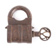 An 18th/19th century French wrought iron screw type padlock: the key with circular scroll decorated