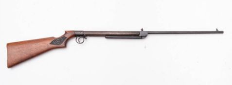 A BSA .177calibre break barrel air rifle: serial number 748, with chequred logo stock.
