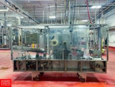 PMMI S/S Single-Lane Cup Filler and Sealer with Assorted Sized Dies and Allen-Bradley SLC 5/01 CPU w