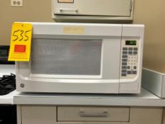 GE 1,100 Watt Microwave Oven - Rigging Fee: $50