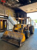 John Deere 300B Loader and Backhow Loader (6,571.4 Hours) - Rigging Fees: $150