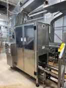 Statco Caser with Case Inverter and Elevated Case Conveyor with Wash Room