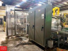 Douglas Machine, Inc. Axiom IM Case and Tray Packer (Location: Dothan, AL)