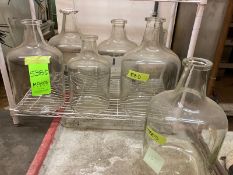 7 large glass Carboys & 1 white wire shelf and 1 black platic shelf - 3 carboys @ 5 gallon Kimex,