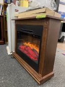 1 GE Floor-mounted mini-refrigerator model#GMR04AAMWW; one(1) Heat Surge Electric Fire Place /Heater