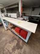 TABLE WITH PLASTIC TOP, MOUNTED ON CASTERS, 84