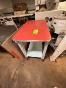 TABLE MOUNTED ON CASTERS42